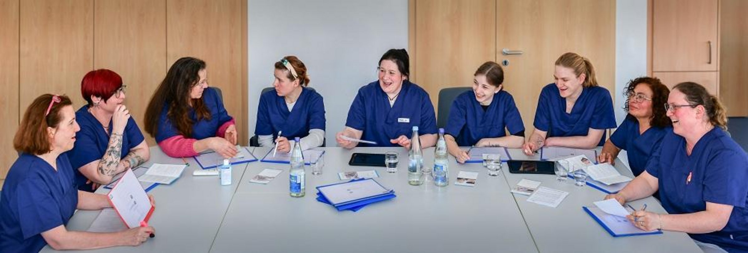 Pflegekräfte der Sozialstation bei einer Besprechung