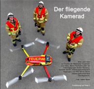 Bild von oben mit der Feuerwehr-Drohne und drei Feuerwehrleuten.
